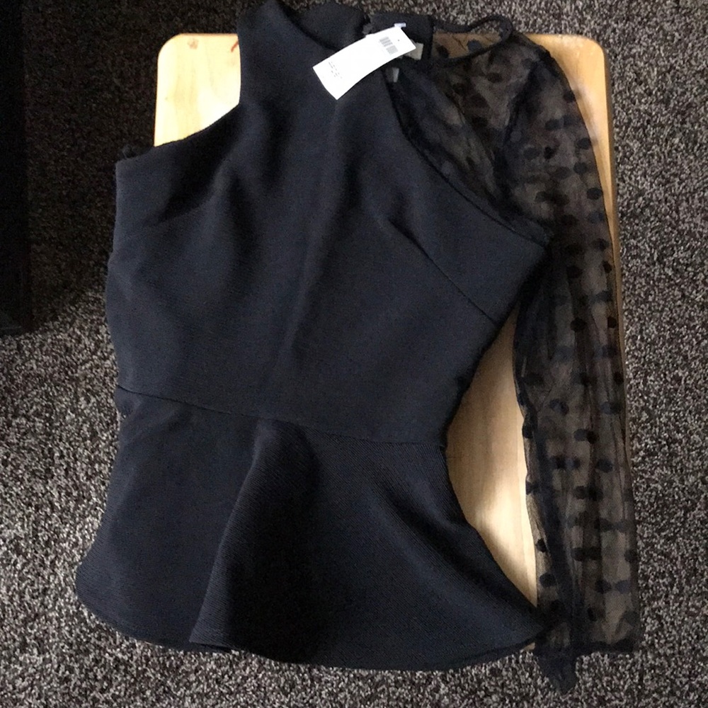 Peplum top one mesh sleeve with polka dots